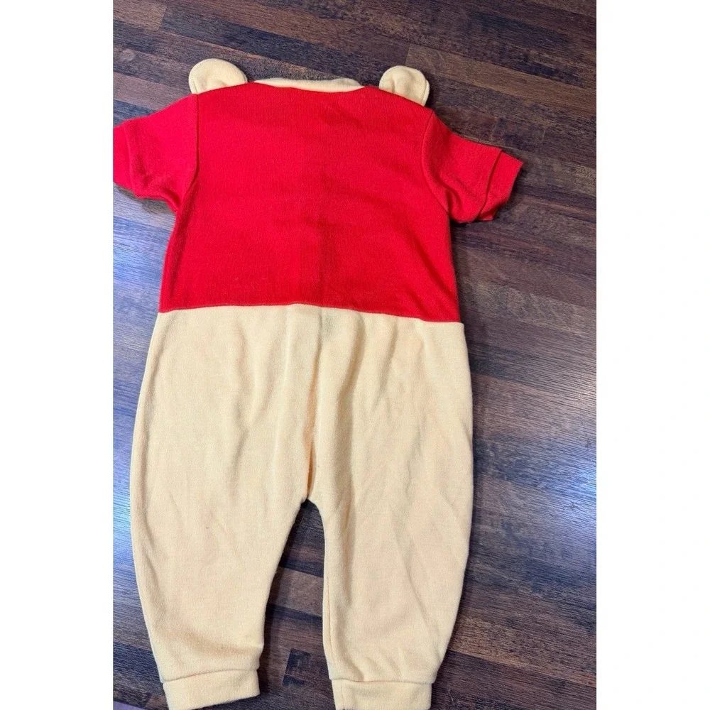 Vintage Winnie the Pooh Disney outfit.  Size newborn small 0-11 pounds